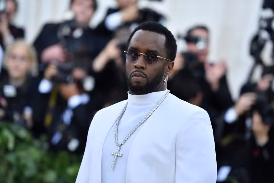 108770335-files-sean-combs-arrives-for-the-2018-met-gala-on-may-7-2018-at-the-metropolitan-museum-of.avif